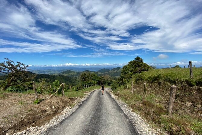 3-in-1 Monteverde Cloud Forest Waterfalls, Wild Trekking and Horseback Riding - Swimming beneath the falls