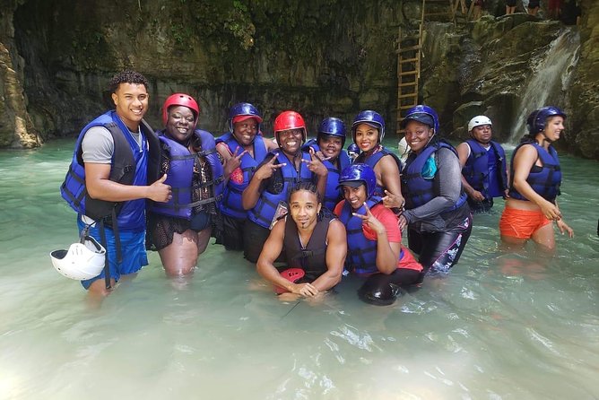 Amber cove and Taino Bay 7 Waterfall Zip lined & Dominican food - Jumping and sliding through Damajagua