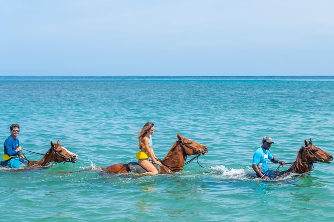 ATV, Horseback Ride, Zipline, Falls Climb + Lunch from Ocho Rios - Ziplining above Dunn’s River Falls