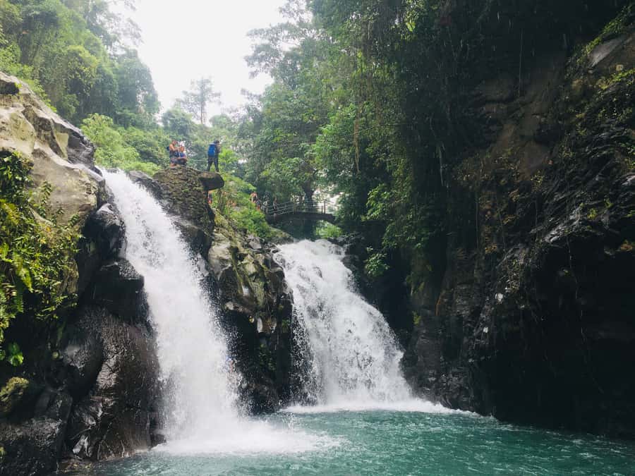 Bali: Sambangan Waterfalls Trekking, Sliding, & Jumping Trip - Pucuk Waterfall and the optional 15-meter leap