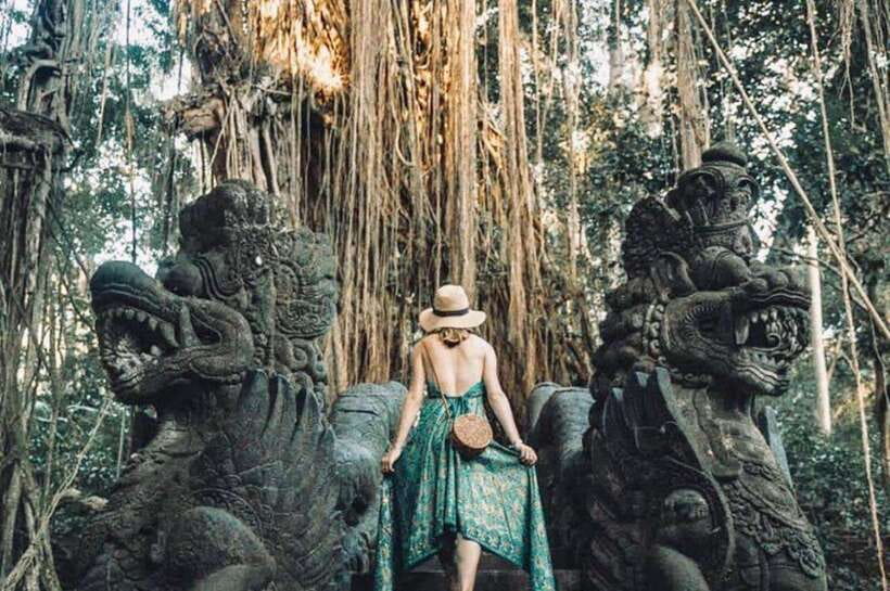 Bali: Ubud Monkey Forest, Waterfall, and Rice Terrace Tour - Cooling off at Tegenungan Waterfall