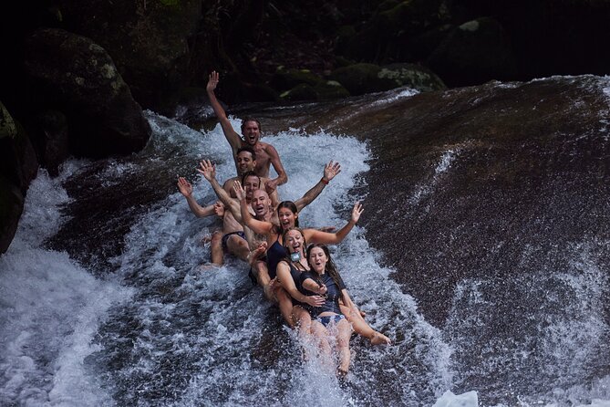 Barefoot Atherton Tablelands Adventure by Cairns Waterfalls - Lake Eacham gives the day its calm center