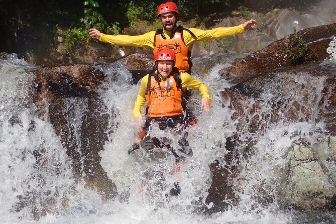Behana Canyoning Tour by Cairns Waterfalls - Walking into the gorge and getting used to the water