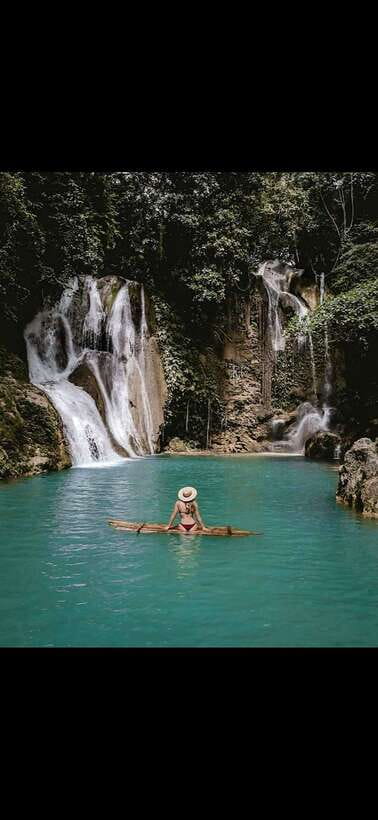 Bohol: Waterfall Hopping & Secret Jungle Trails Guided Tour - Crossing fields before the forest trail