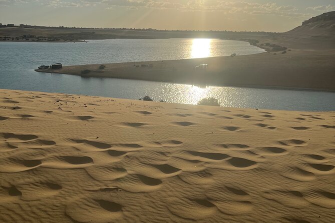 Cairo. Fayum Oasis 4<em>4 Desert Safari, Sand Surf ,Waterfall Tour – Key points before you book’ /></p>
<ul>
<li><strong>Wadi El Rayan waterfalls:</strong> See Egypt’s largest waterfalls, a surprising sight in an otherwise dry desert setting.</li>
<li><strong>Private 4×4 adventure:</strong> After reaching Fayoum by air-conditioned vehicle, you switch to a 4×4 for dune bashing and access to the desert sites.</li>
<li><strong>Sandboarding included:</strong> The session is part of the price, so you can try the dunes without paying an extra activity fee.</li>
<li><strong>Qarun Lake and Mudawara Mountains:</strong> The day pairs open desert views with one of Egypt’s oldest natural lakes and photo stops in the mountains.</li>
<li><strong>Guides Abdalla and Ahmed:</strong> One highly praised outing featured Abdalla as the guide and Ahmed driving the Land Rover, with Ahmed even turning the vehicle into a Bedouin-style tent.</li>
<li><strong>Good package value:</strong> At $135 per person, the price covers transport, lunch, water, entrance-related fees, sandboarding, and the 4×4 ride.</li>
</ul>
<h2>Leaving Cairo for Fayoum’s open country</h2>
<p><img width="669" height="446" decoding="async" src=