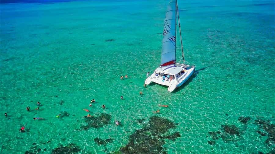 Catamaran Trip to Ile au Cerfs with Lunch and GRSE waterfall - Sailing into the lagoon and snorkeling
