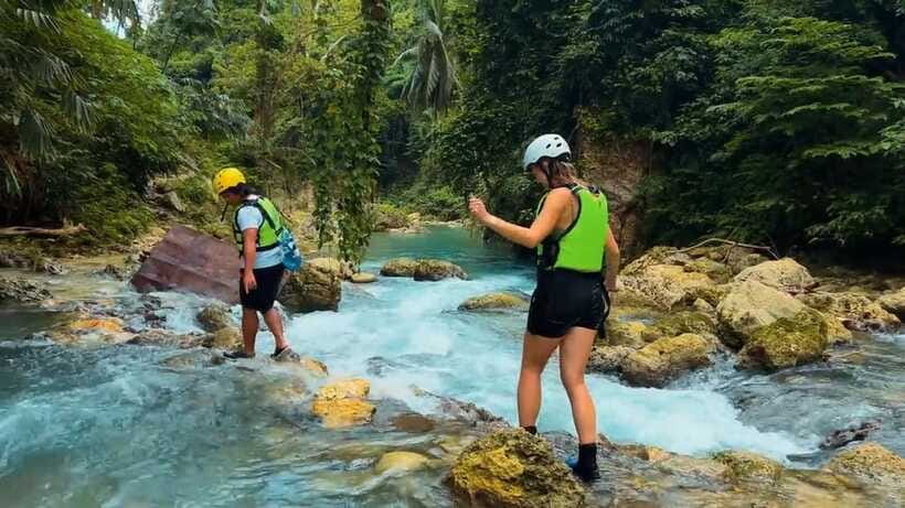 Cebu: Kawasan Falls Canyoneering Tour with Ziplining & Lunch - Entering the Canyon With Helmet and Life Vest
