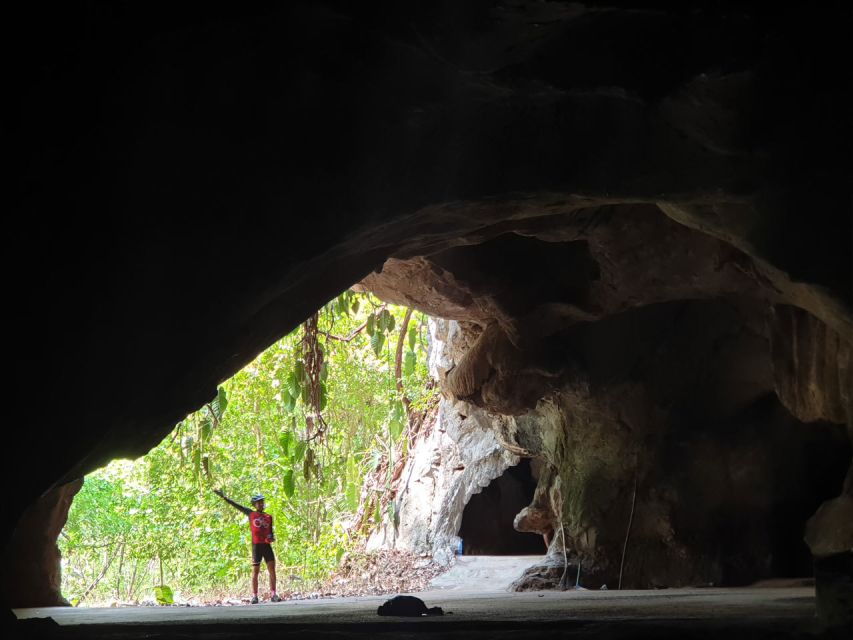 Chiang Mai: Boat Ride and Cycling Tour to Sticky Waterfall - Crossing Mae Kuang reservoir by longtail boat