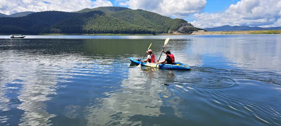 Chiang Mai: Sticky waterfall, lake kayak and cycling tour - Long-tail boat to Mae Ngat Dam