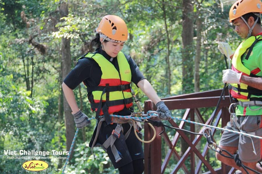 Dalat: Canyoning Extreme Adventure at Datanla Waterfall - Sliding through the river