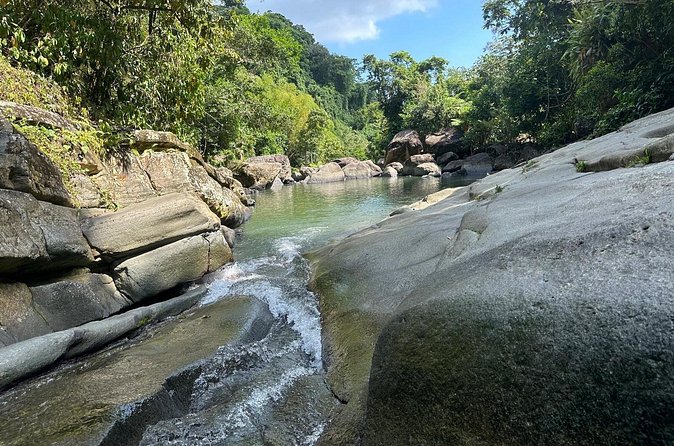 El Yunque & Beach Tour: Waterslide, Waterfall, Food, & Photos - What to pack for a smoother day