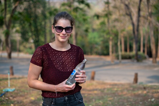 Erawan Waterfalls and Bridge Over River Kwai Tour from Bangkok - Guides, group size, and the human side of the tour