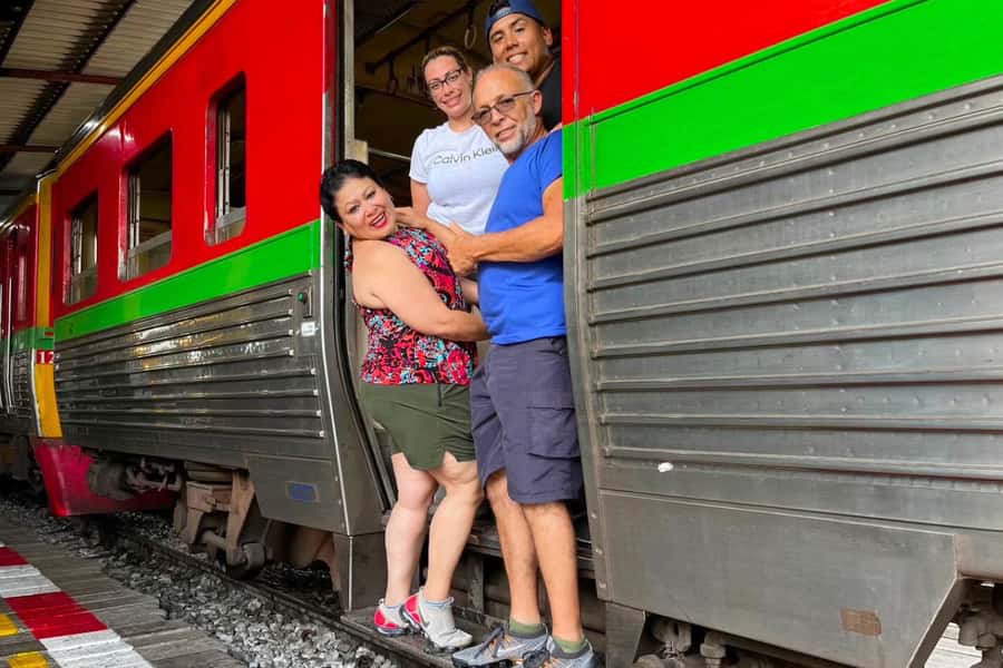 Floating and Railway Market with Waterfall Option: Private - Riding the train into Mae Klong Railway Market