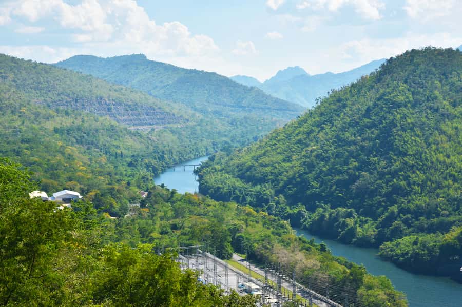 From Bangkok: Erawan Waterfall & Kanchanaburi Private Tour - Krasae Buddha Cave and the wooden railway