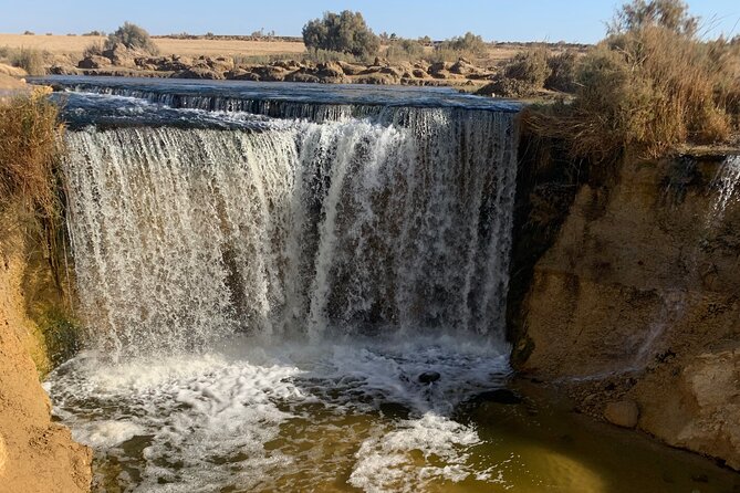 From Cairo: Desert Safari, Waterfalls, Sand boarding and Camel ride with Lunch - Mudawara Mountains and the 4x4 desert drive
