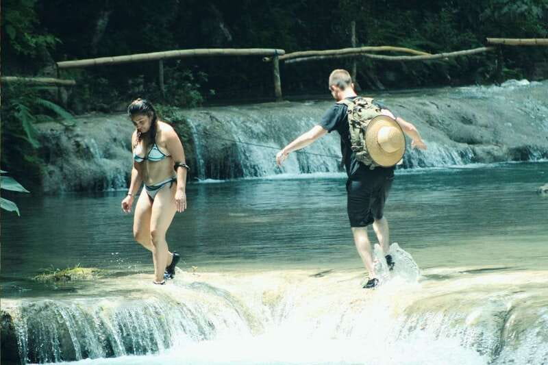 From Huatulco: Magical Copalitilla Waterfalls with Entry - A community market with coffee, mezcal, and local products