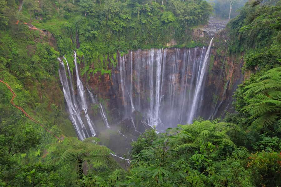 From Malang or Surabaya: Tumpak Sewu Waterfall Group Tour - Goa Tetes brings a quieter kind of adventure