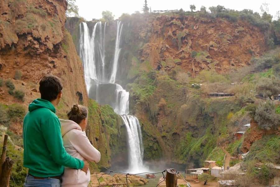 From Marrakech: Ouzoud Waterfalls Guided Hike and Boat Tour - A short boat ride under the falling water