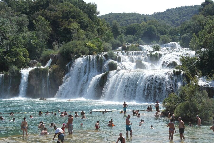 From Omiš: Krka Waterfalls and Trogir Group Tour - Skradin: one hour by the water
