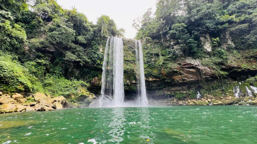 From Palenque: Misol-Ha & Agua Azul Waterfalls Day Tour - Misol-Ha: a cool first stop under the falls