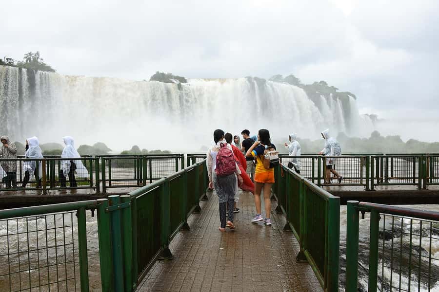 From Puerto Iguazu: Half-Day Brazilian Falls Excursion - Entering Iguaçu National Park