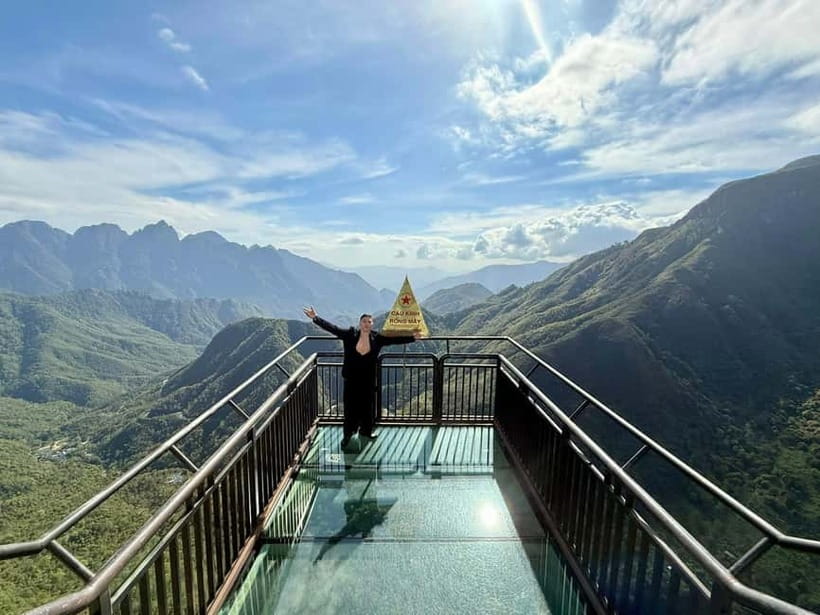From Sapa: Glass Bridge and Silver Waterfall Group Tour - Walking across the Rong May Glass Bridge