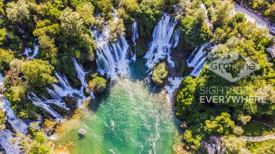 From Split and Trogir: Mostar Tour with Kravica Waterfalls - Kravica Waterfall: beautiful, busy, and refreshing