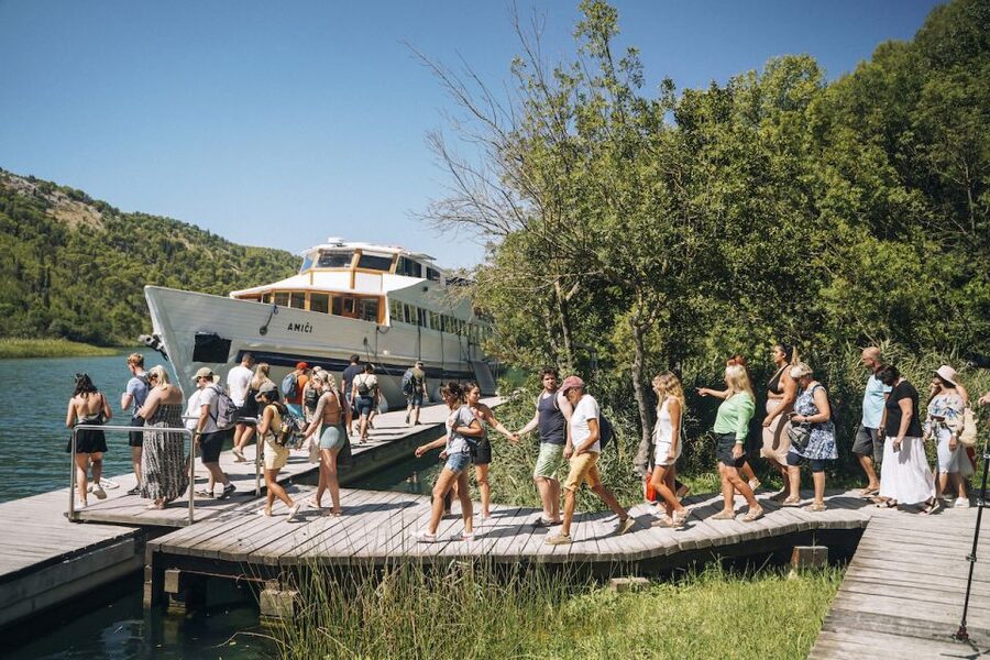 From Split: Krka Waterfalls Tour with Boat Cruise & Swimming - Jaruga hydroelectric plant and the useful history behind the scenery