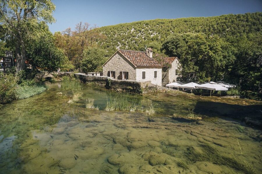 From Split: Krka Waterfalls Tour with Boat Cruise & Swimming - Skradin: fortress views, local cake, and a swim