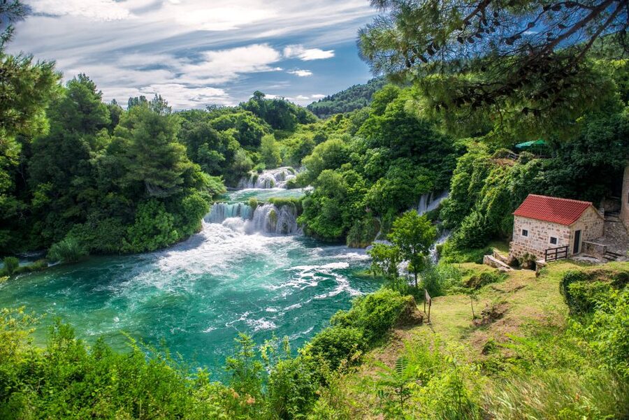 From Split: Krka Waterfalls Tour with Boat Ride & Swimming - Walking the Wooden Paths at Skradinski Buk