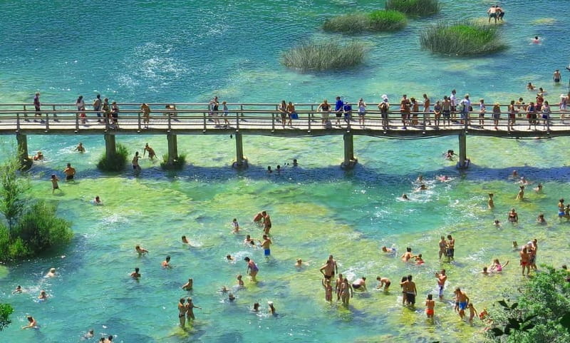 From Split: Krka Waterfalls with Riverboat Ride & swimm stop - Krka National Park: waterfalls, mills, and walking paths