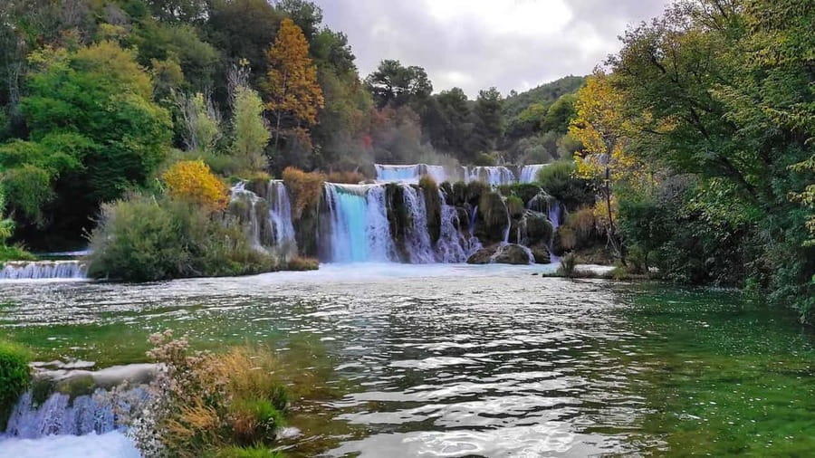 From Trogir, Seget & Okrug: Krka Waterfalls Culture Tour - Walking the wooden paths at Skradinski buk