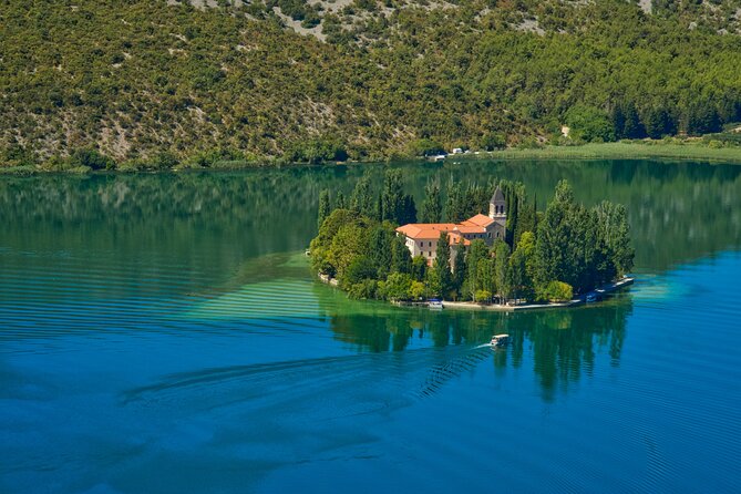 From Zadar: Krka National Park and Waterfalls Day Trip - Taking the river from Skradin to the falls