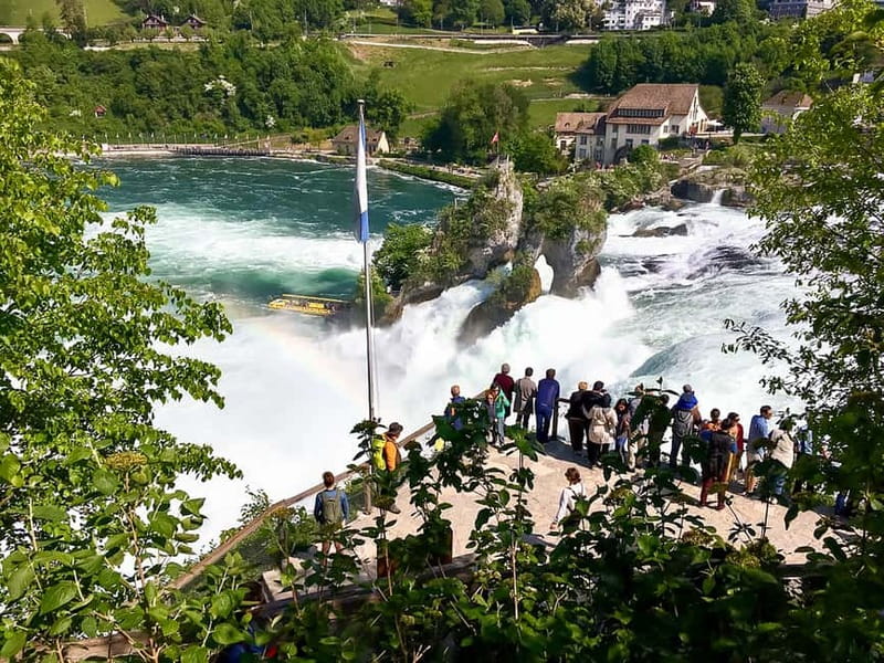 From Zurich: Rhine Falls Coach Tour with Entry Tickets - From Zürich streets to Marthalen vineyards
