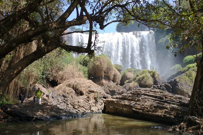 Full Day Private Silk Village And Elephant Waterfall Tour - Pink Grass Hill gives you a short countryside walk