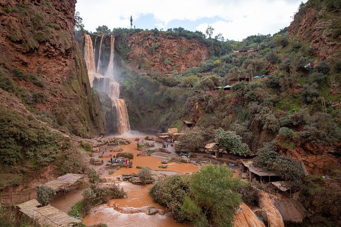 Full Day Trip To Ouzoud Waterfalls From Marrakech & Boat Tour - The hand-powered boat ride at the base