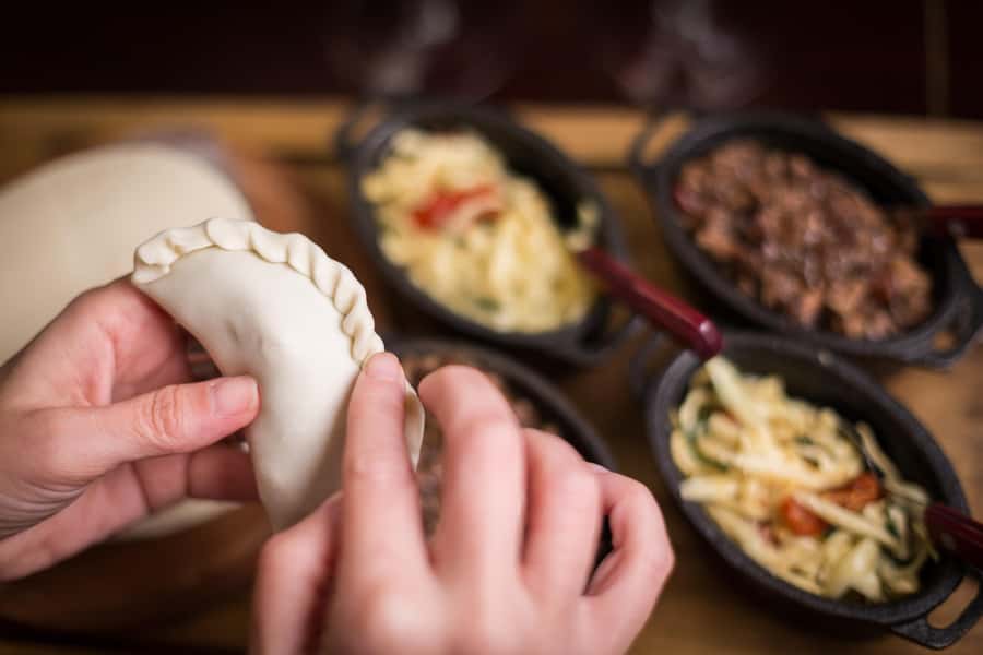 Iguazu Falls: The Argentine Experience Interactive Dinner - Folding empanadas with repulga techniques