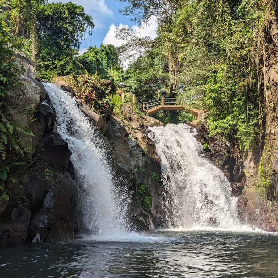 Jumping Sliding at Aling- Aling Waterfall and Handara Gate - Handara Gate is made for photographs