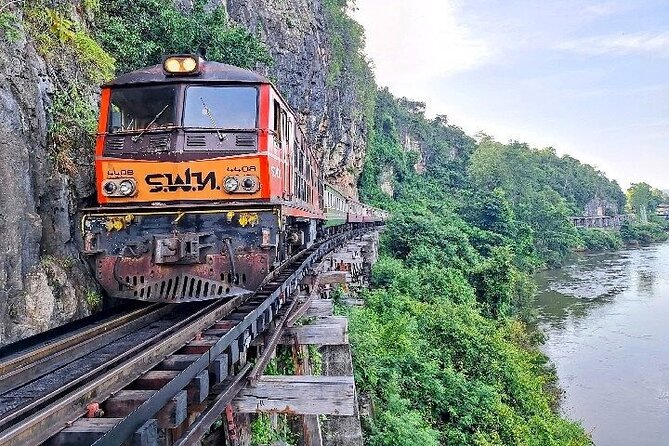 Kanchanaburi Day Trip: WWII Death Railway & Erawan Falls - Walking across the River Khwae Bridge