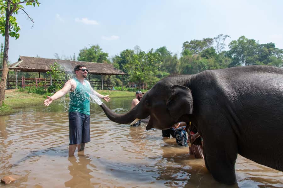 Kanchanaburi: Elephant Sanctuary & Erawan Waterfall Tour - What to pack for a wet, active day