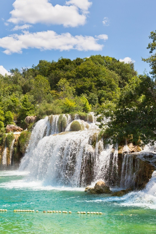 Krka Waterfalls Excursion from Makarska Riviera - Walking through Skradinski Buk