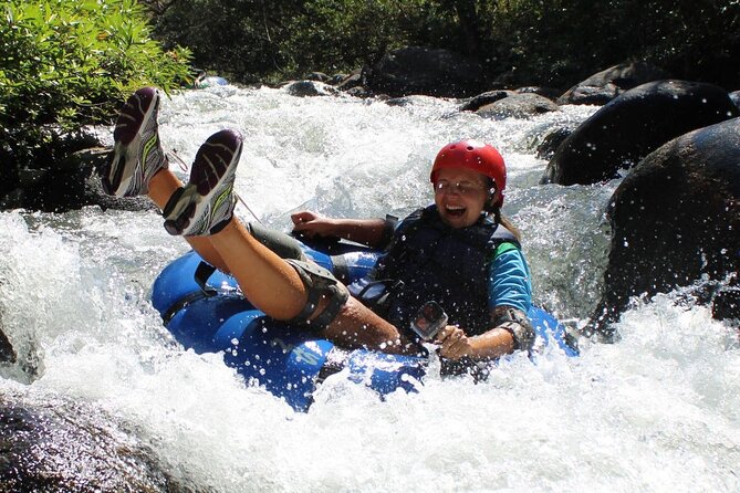 La Leona Waterfall Hike and River Tubing - Tubing through canyons and fast water