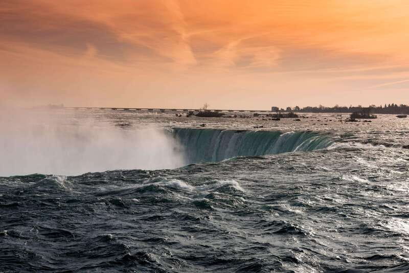 Niagara Falls Day Tour with Boat Ride & Journey Behind Falls - Journey Behind the Falls: a quieter view with real force