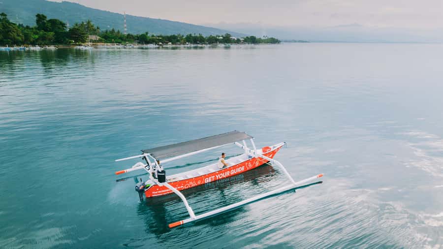 North Bali: Dolphin, Ulun Danu Temple, & Banyumala Waterfall - Sunrise and dolphins on the Lovina boat