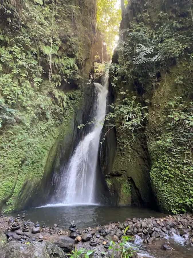 North Bali: Explore Munduk Waterfall Trekking Experience - Red Coral Waterfall starts the walk