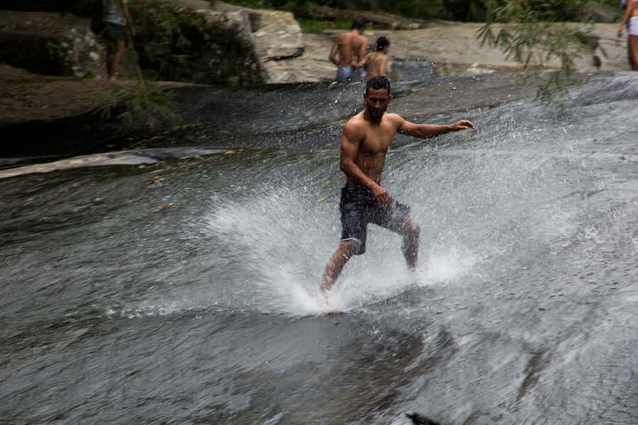 Paraty: Jungle Waterfalls and Cachaça Distillery Jeep Tour - Tobogã Waterfall, where the rock becomes a slide