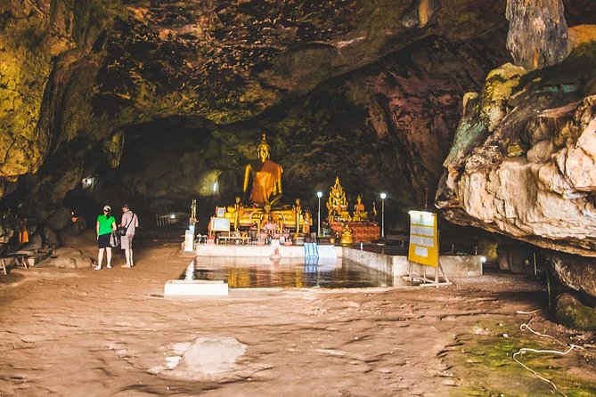Private Tour: Death Railway, Hellfire Pass and Erawan Waterfall - Walking the Death Railway near the river