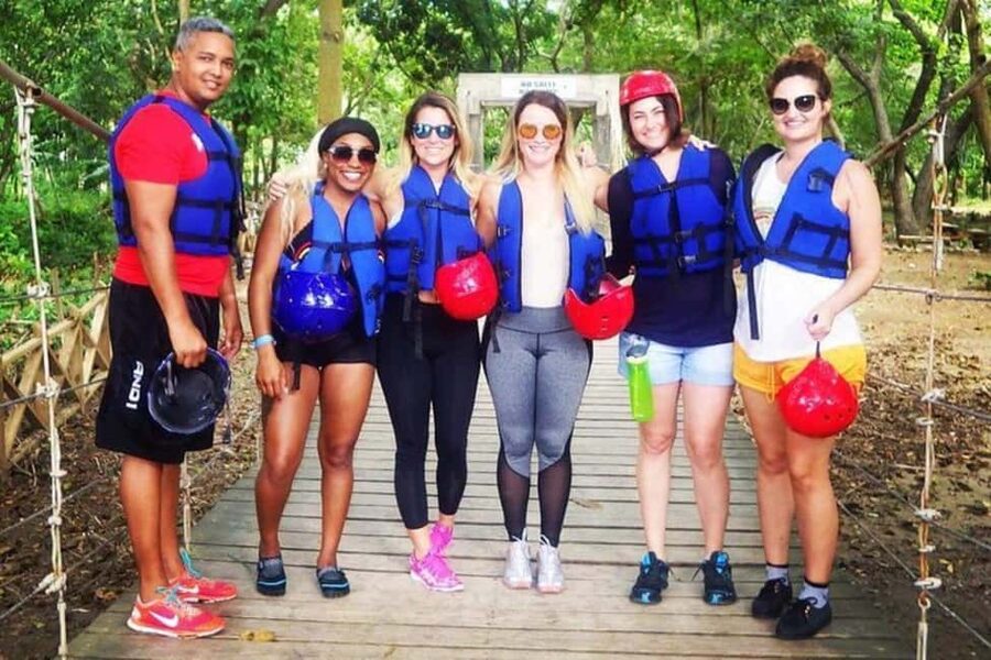 Puerto Plata: 27 Waterfalls Adventure with Traditional Lunch - Getting fitted with a helmet and life jacket