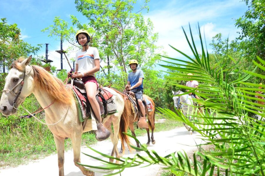 Punta Cana: Bávaro Adventure Park Horse Riding & Waterfalls - Cooling Off At The Waterfall Pool