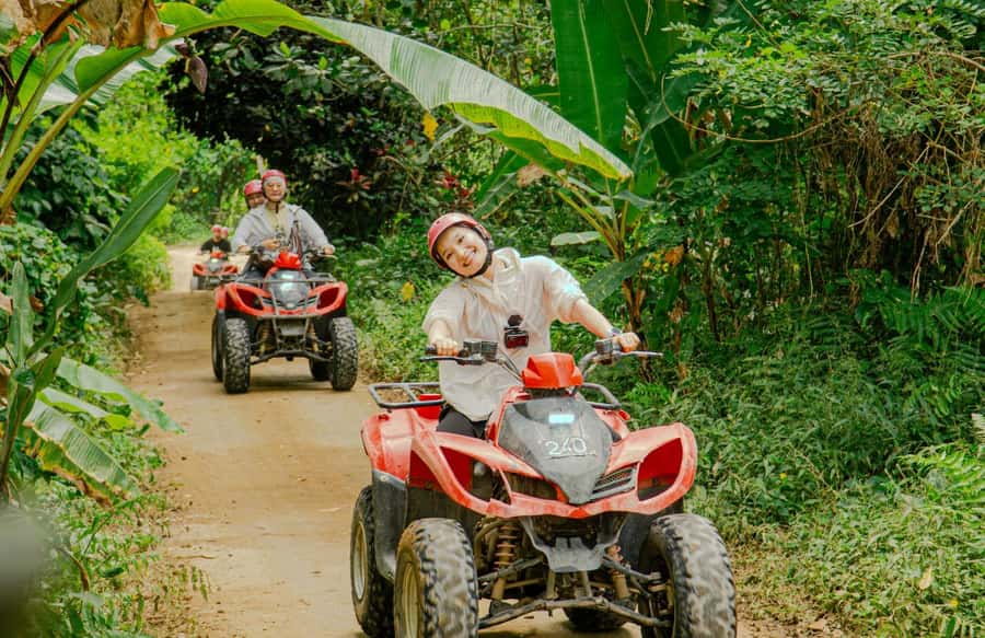 Quad Bike Bali With Tunnel & Waterfall Tour - The waterfall stop and photo opportunity